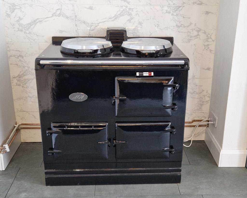 <p>2 Oven Electric Aga in Black </p><p>Installed in Long Bredy</p>